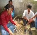 Artisans working with bamboo strips
