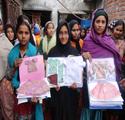 Participants displaying their completed training work