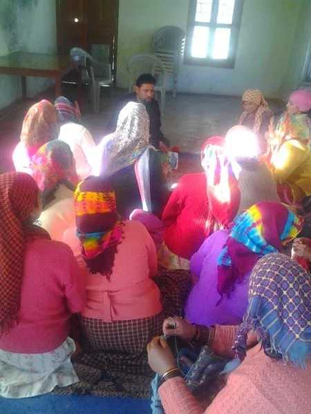 Women gathered for the Bhotia Tribe community programme