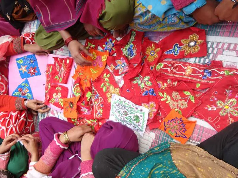 Colourful embroidered and handmade textile products on display