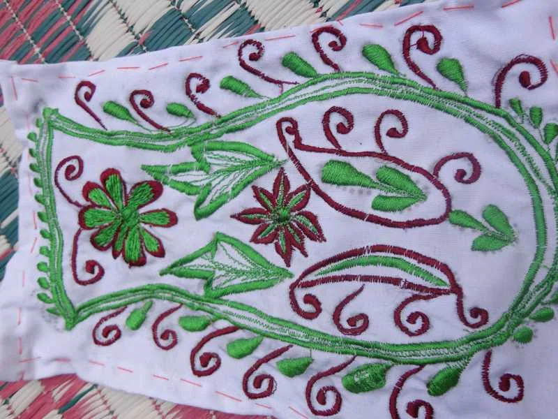Detail of floral embroidery made by programme participants