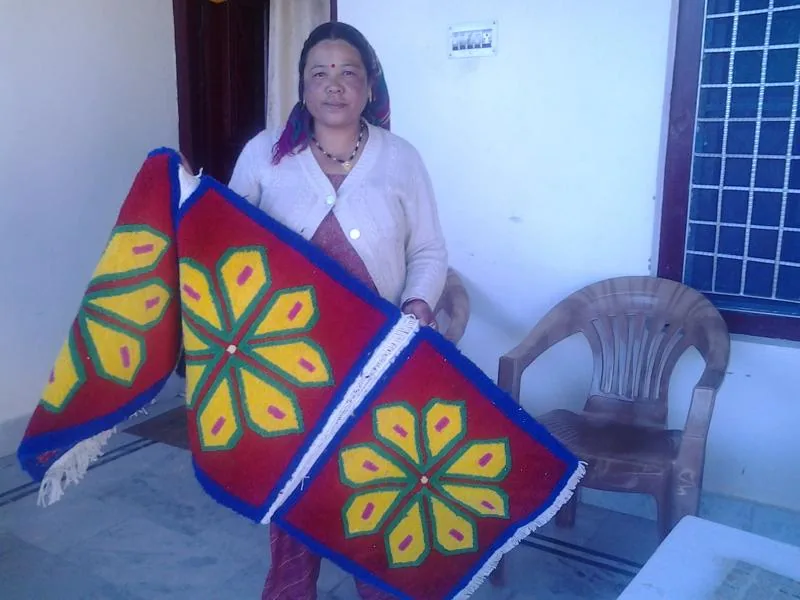 Participant displaying a colourful patchwork textile