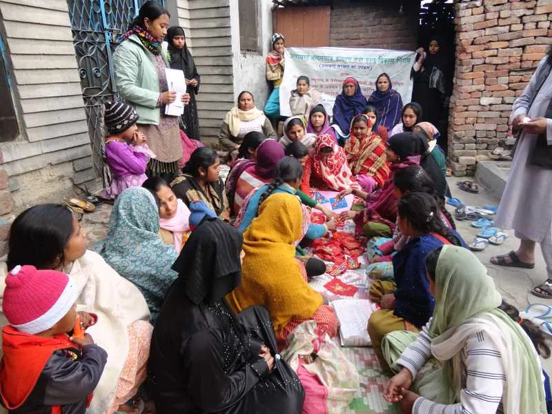 Women and facilitators gathered for community training
